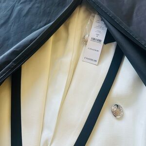 WHBM 
Blazer never used.